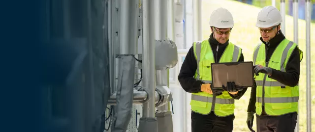 Equans Sci-Tech employees on site in full PPE
